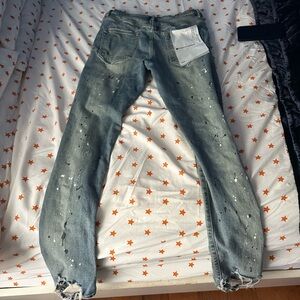 Distressed purple Jeans with Paint Splatter